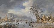 A winter landscape with skaters and kolf players on a frozen river